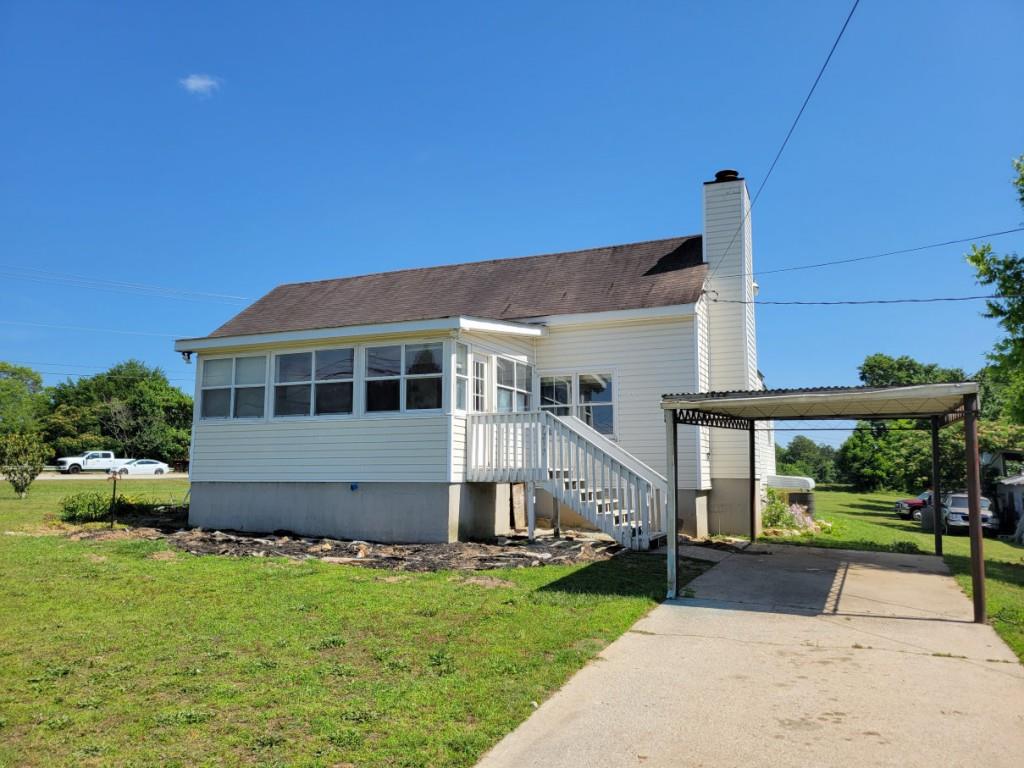 a house view with a garden space