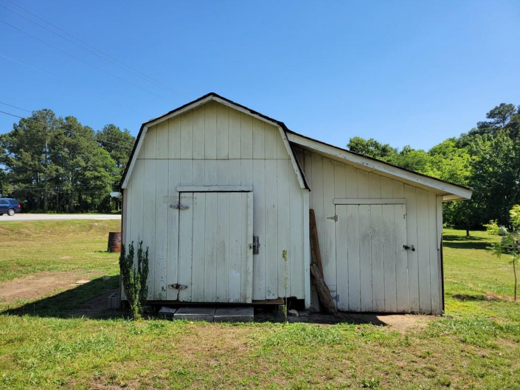 7217 Union Grove Road Lithonia, GA 30058 - Photo 11 of 12 a view of a small house