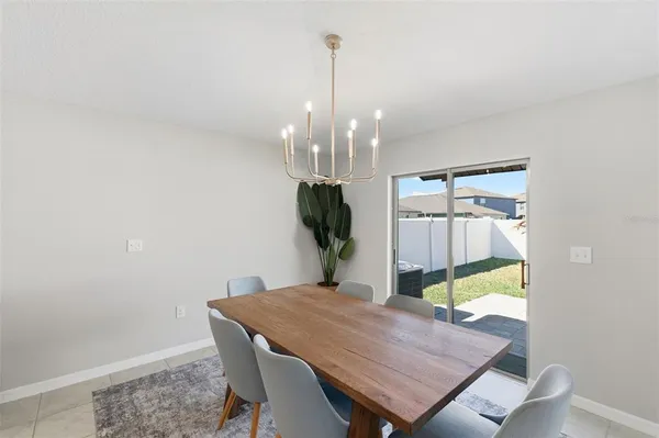 a bedroom with furniture and a table