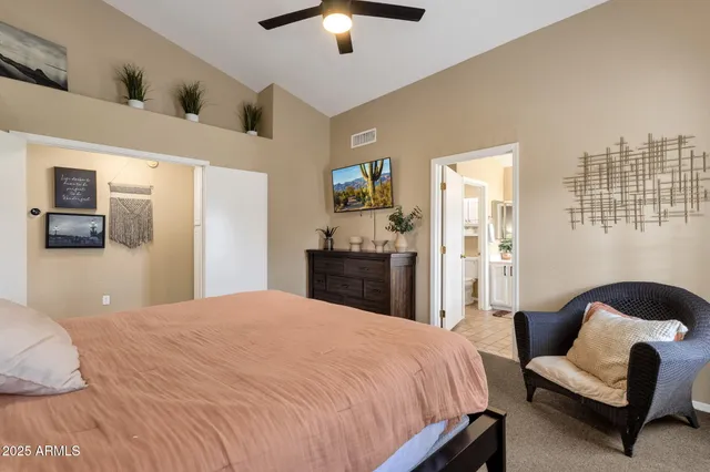 a spacious bathroom with a bathtub and a sink