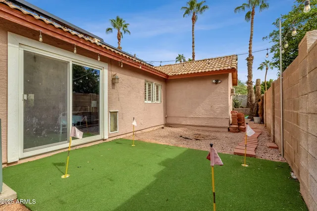 an outdoor space with furniture