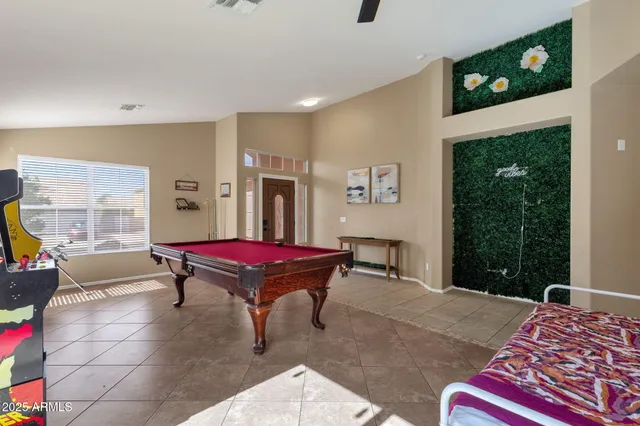 a bed room with a bed and a table