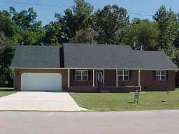 154 Hunt Creek Road Manchester, TN 37355 - Photo 1 of 1 front view of house with a yard