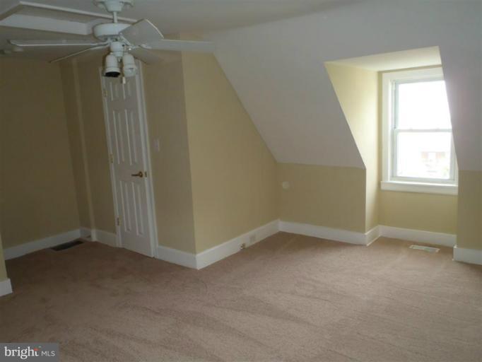 26 Midship Road Dundalk, MD 21222 - Photo 4 of 30 an empty room with windows