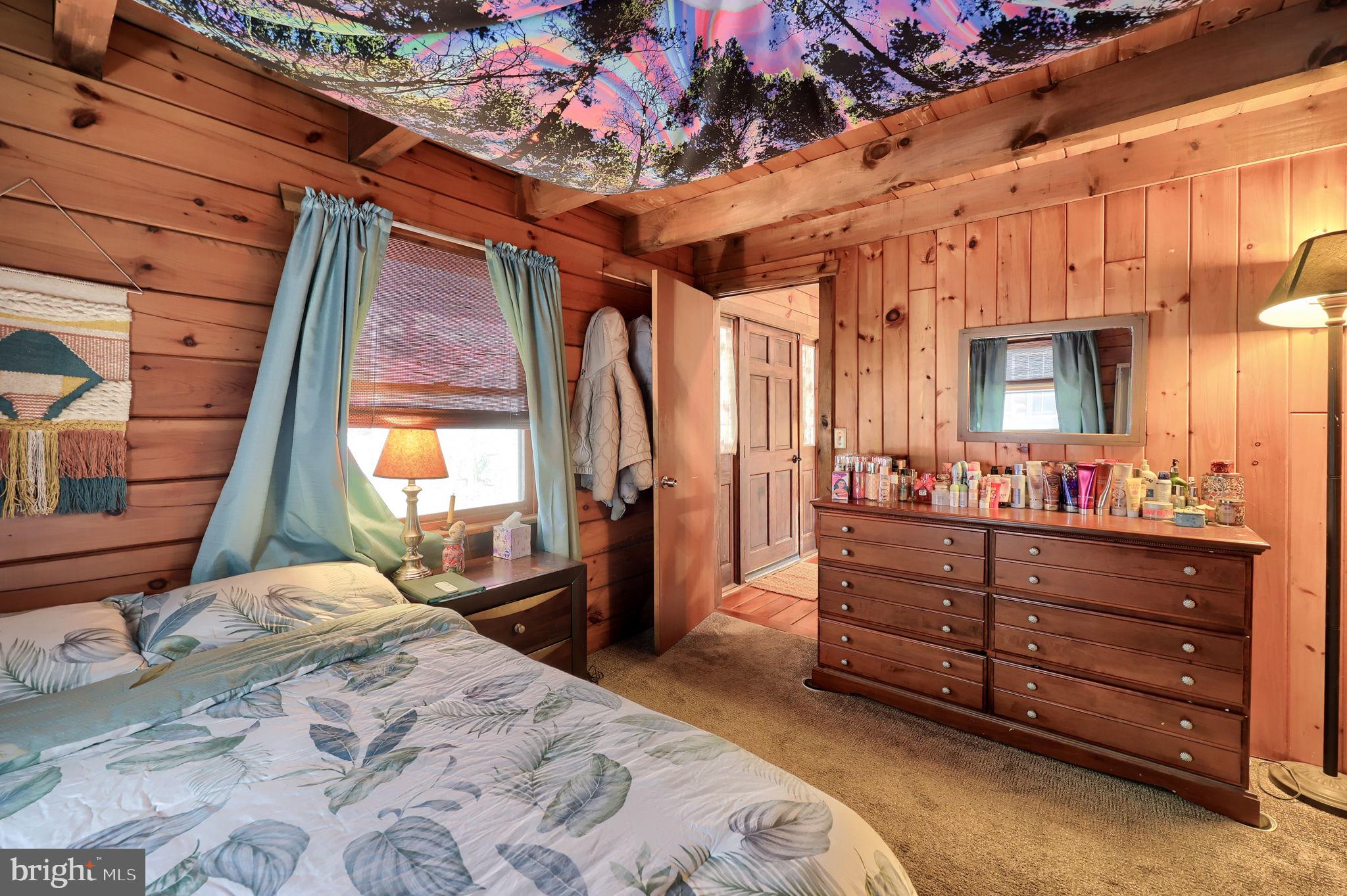 149 Douts Hill Road Holtwood, PA 17532 - Photo 22 of 77 a bedroom with a bed and a dresser