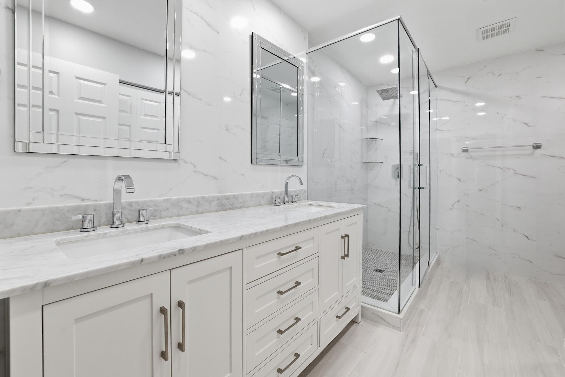 7403 Shell Ridge Terrace Lake Worth, FL 33467 - Photo 13 of 37 a bathroom with a granite countertop sink mirror and double