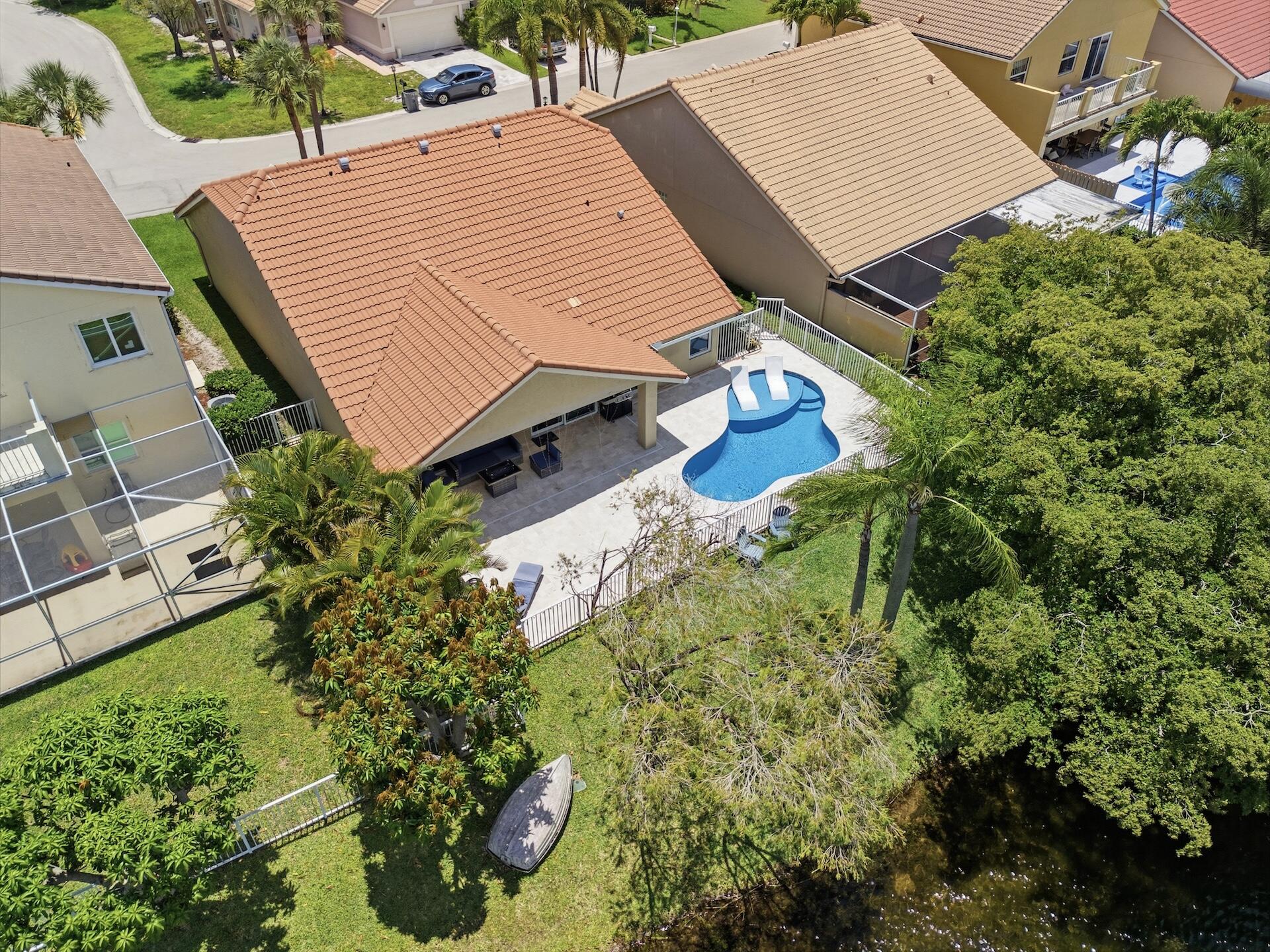 7403 Shell Ridge Terrace Lake Worth, FL 33467 - Photo 26 of 37 an aerial view of a house