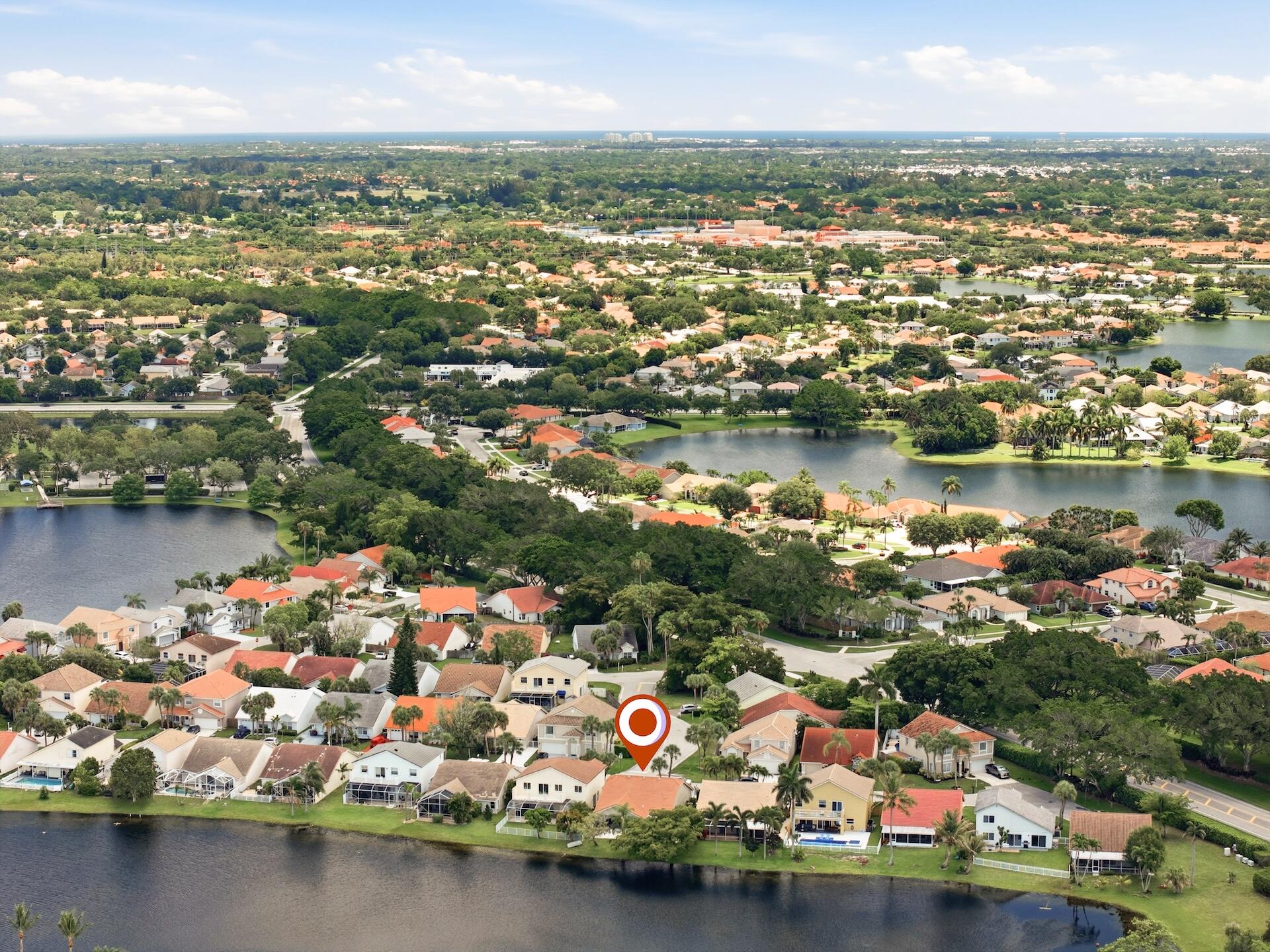 7403 Shell Ridge Terrace Lake Worth, FL 33467 - Photo 30 of 37 an aerial view of residential houses with outdoor space