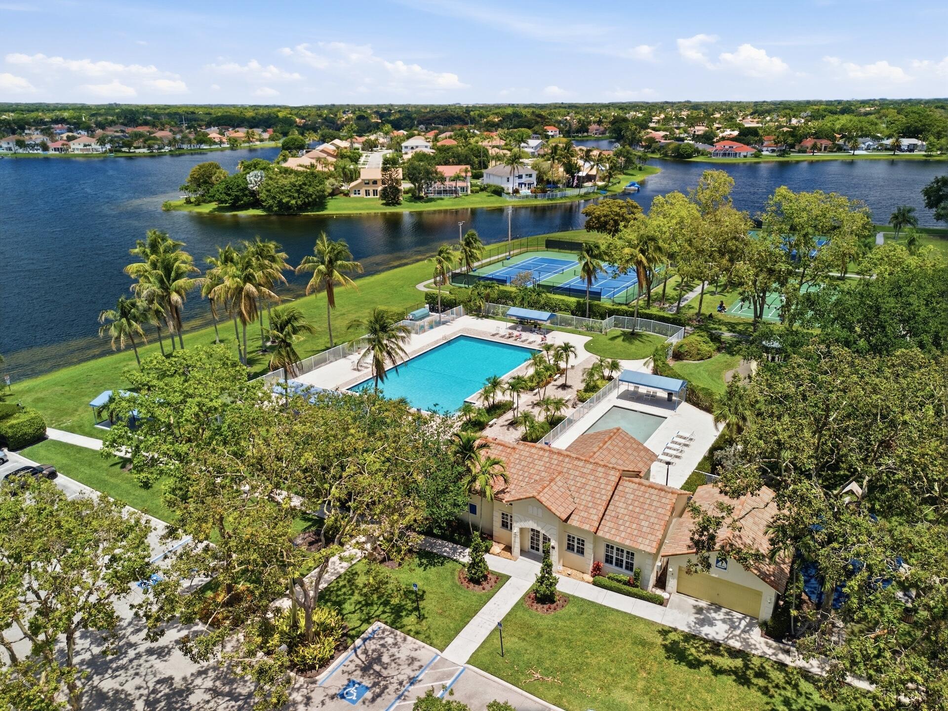 7403 Shell Ridge Terrace Lake Worth, FL 33467 - Photo 34 of 37 an aerial view of residential houses with outdoor space