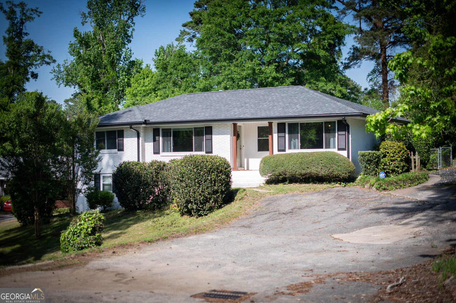 545 Forest Hill Road Macon, GA 31210 - Photo 3 of 63 a view of a house with a yard plants and large tree