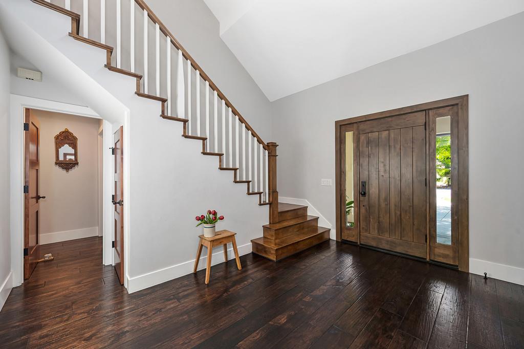 38318 Larue Way Davis, CA 95616 - Photo 11 of 92 a view of entryway with wooden floor and stairs