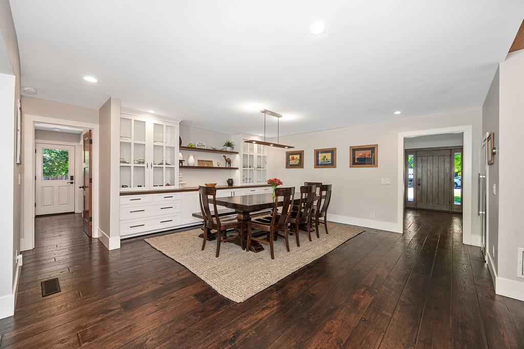 38318 Larue Way Davis, CA 95616 - Photo 13 of 92 a view of a dining room with furniture and wooden floor