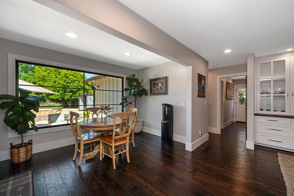 38318 Larue Way Davis, CA 95616 - Photo 17 of 92 a dining room with furniture and wooden floor