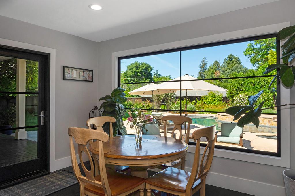 38318 Larue Way Davis, CA 95616 - Photo 19 of 92 a view of a dining room with furniture window and outside view