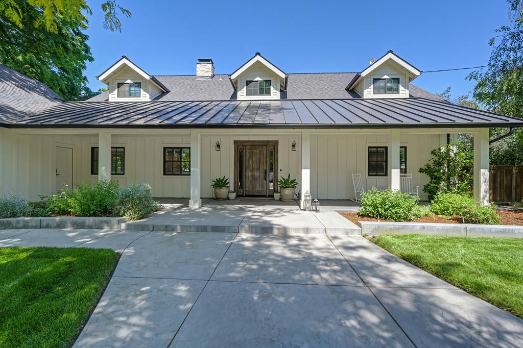 38318 Larue Way Davis, CA 95616 - Photo 2 of 92 a front view of a house with a yard