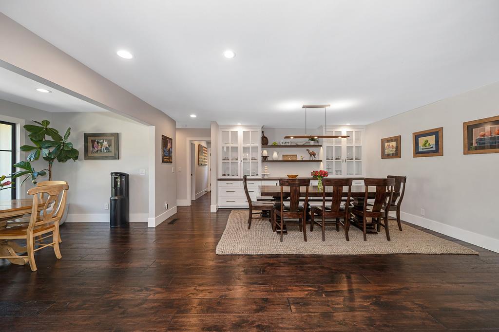 38318 Larue Way Davis, CA 95616 - Photo 21 of 92 a view of a dining room with furniture and wooden floor