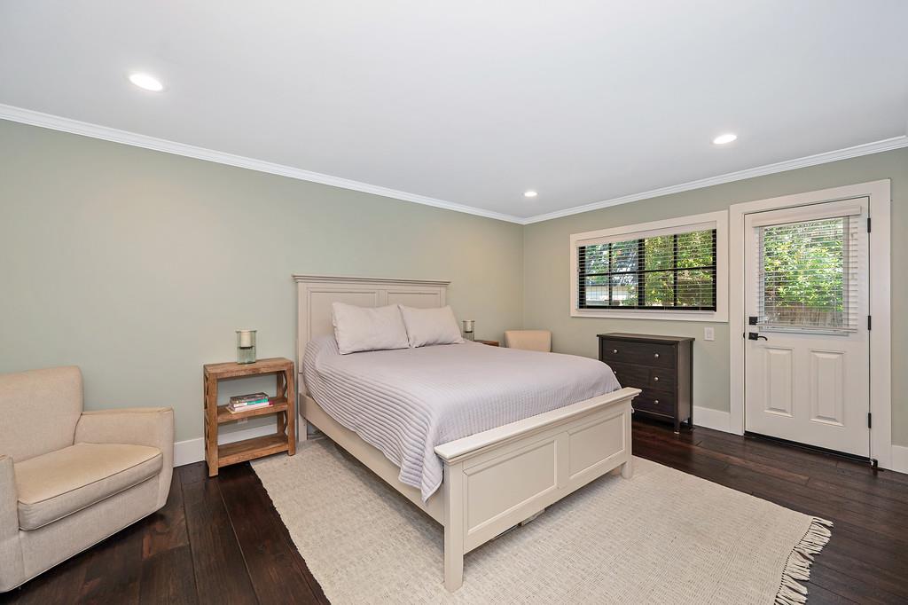 38318 Larue Way Davis, CA 95616 - Photo 36 of 92 a bedroom with a large bed and a couch