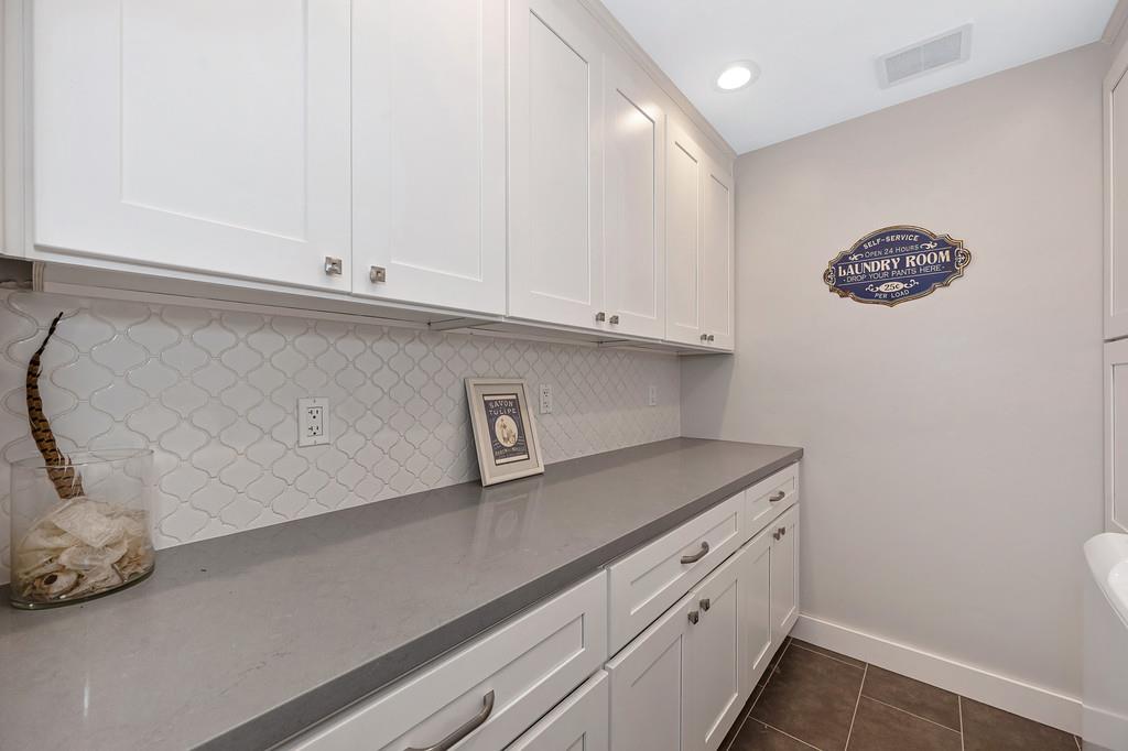 38318 Larue Way Davis, CA 95616 - Photo 45 of 92 a view of cabinets and wooden floor