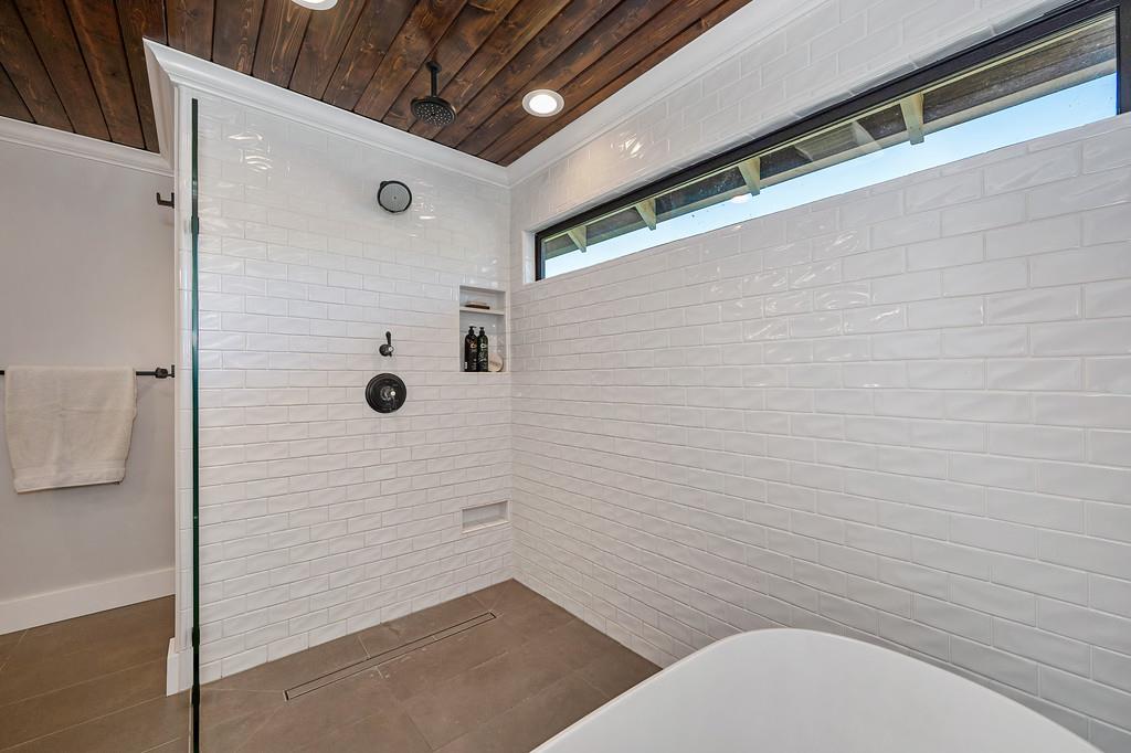 38318 Larue Way Davis, CA 95616 - Photo 59 of 92 a bathroom with a toilet and a shower