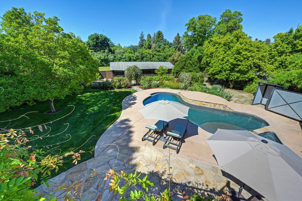 38318 Larue Way Davis, CA 95616 - Photo 64 of 92 an aerial view of a house with a yard basket ball court and outdoor seating