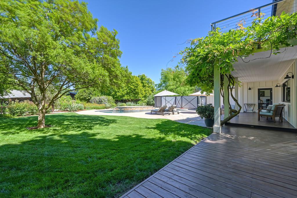 38318 Larue Way Davis, CA 95616 - Photo 65 of 92 a view of a house with a yard and sitting area
