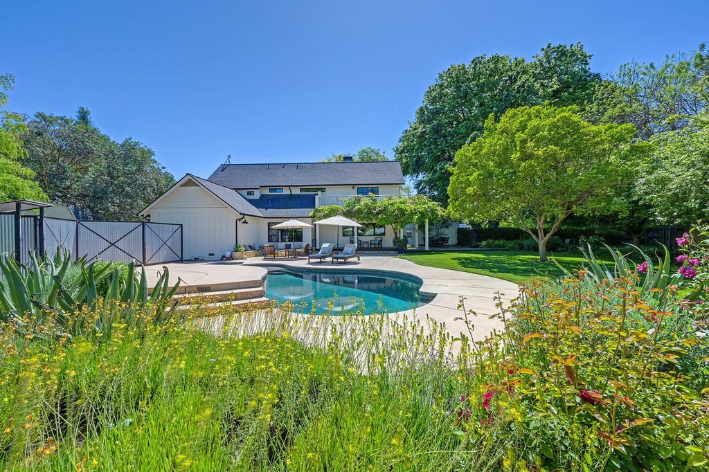 38318 Larue Way Davis, CA 95616 - Photo 69 of 92 a view of a house with swimming pool