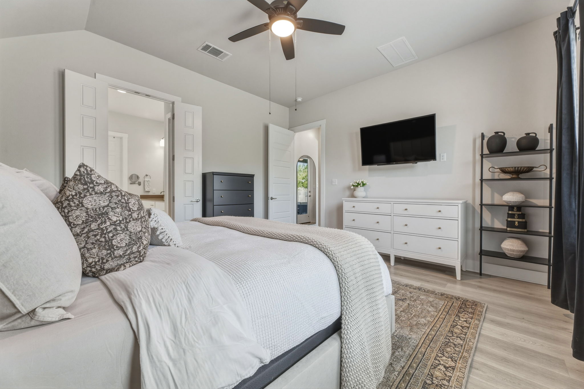 4505 Post Loop Round Rock, TX 78681 - Photo 23 of 40 Bedroom featuring light wood-style flooring, ceiling fan, and lofted ceiling