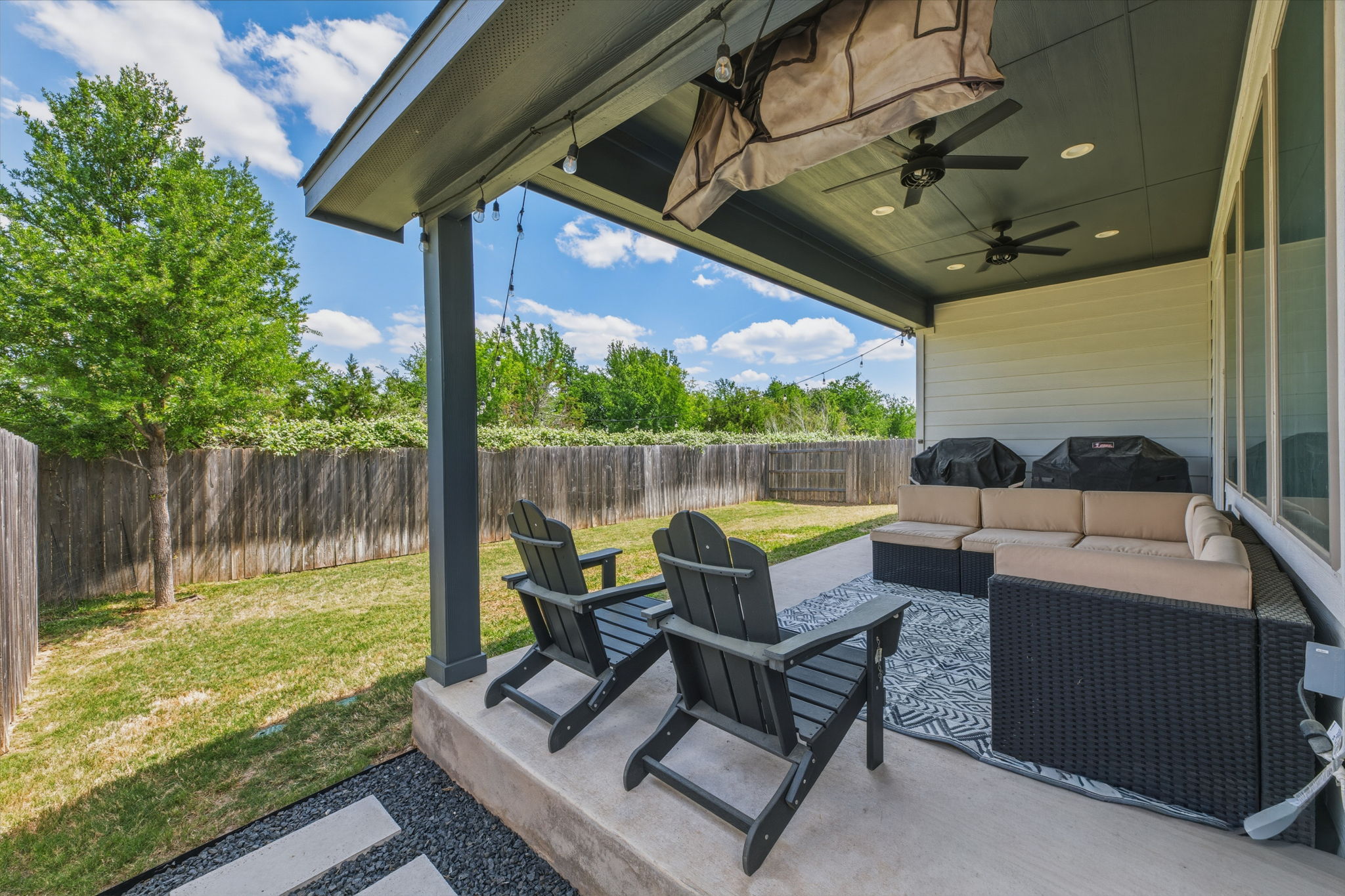 4505 Post Loop Round Rock, TX 78681 - Photo 34 of 40 Fenced backyard featuring a patio, a ceiling fan, and an outdoor hangout area
