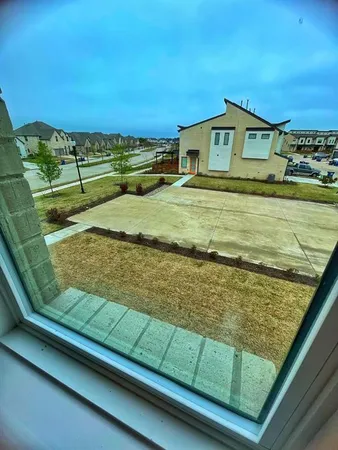 a view of swimming pool from a balcony