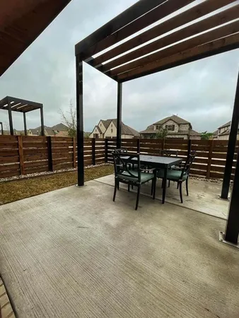 a view of a terrace with chairs