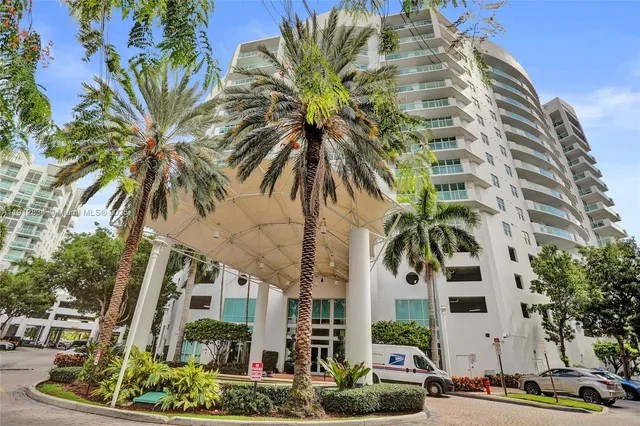 a view of multiple house with a street