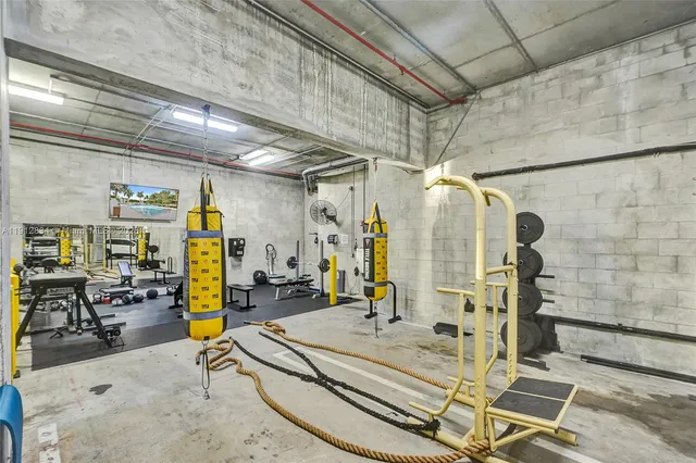 a view of a room with gym equipment