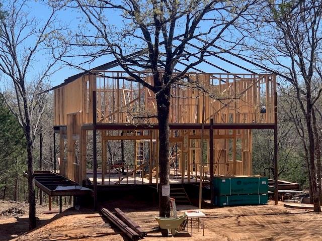 924 The Oil Road Gainesville, TX 76240 - Photo 34 of 39 Erecting Walls and Roof