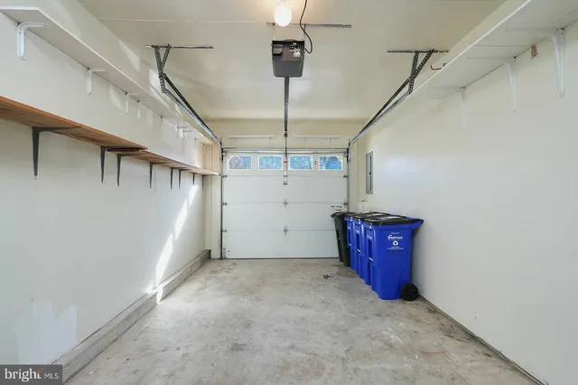 a view of a hallway with stairs