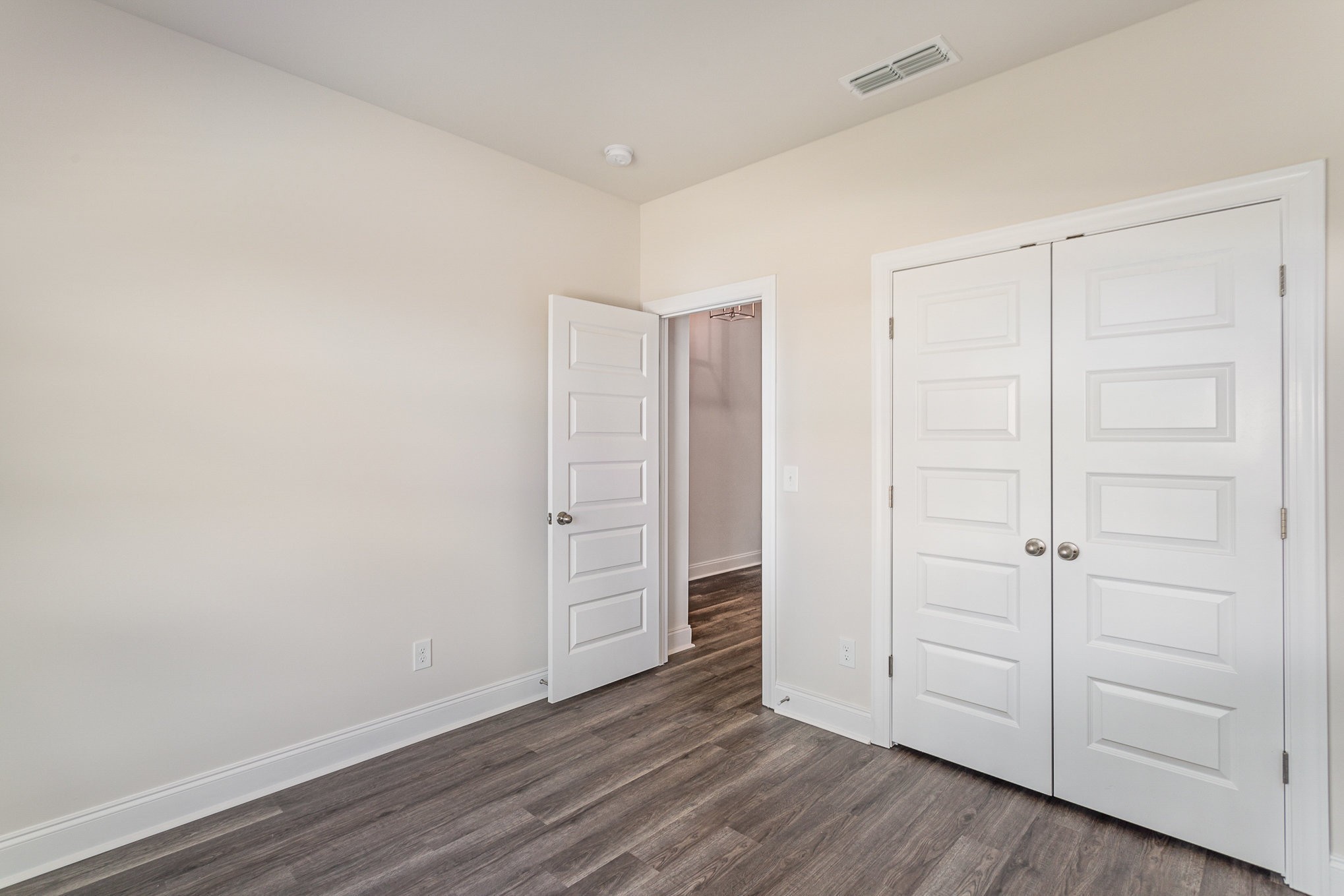 6417 Waymeet Dr Spring Hill Spring Hill, TN 37174 - Photo 11 of 26 an empty room with wooden floor