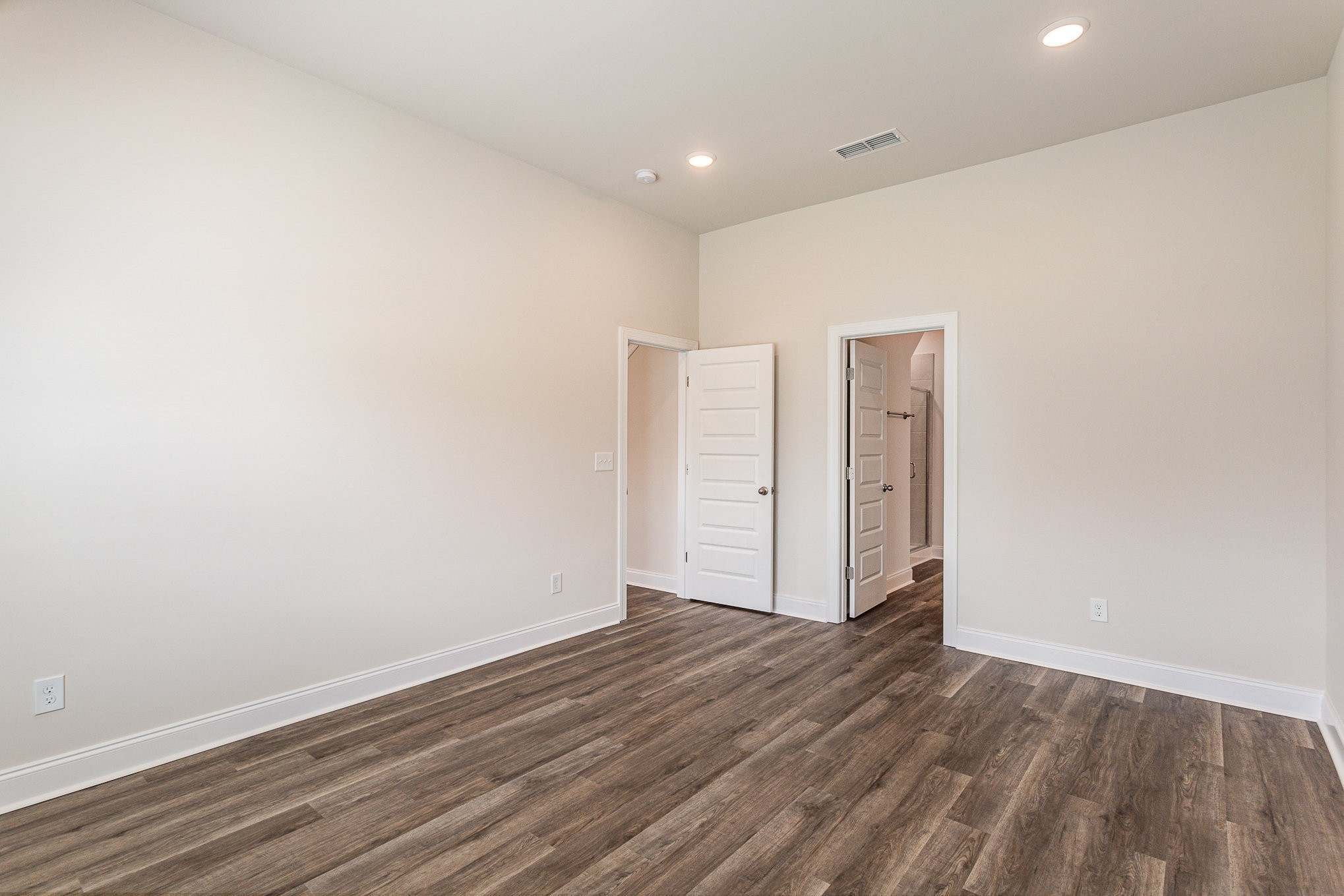 6417 Waymeet Dr Spring Hill Spring Hill, TN 37174 - Photo 8 of 26 a view of an empty room with wooden floor