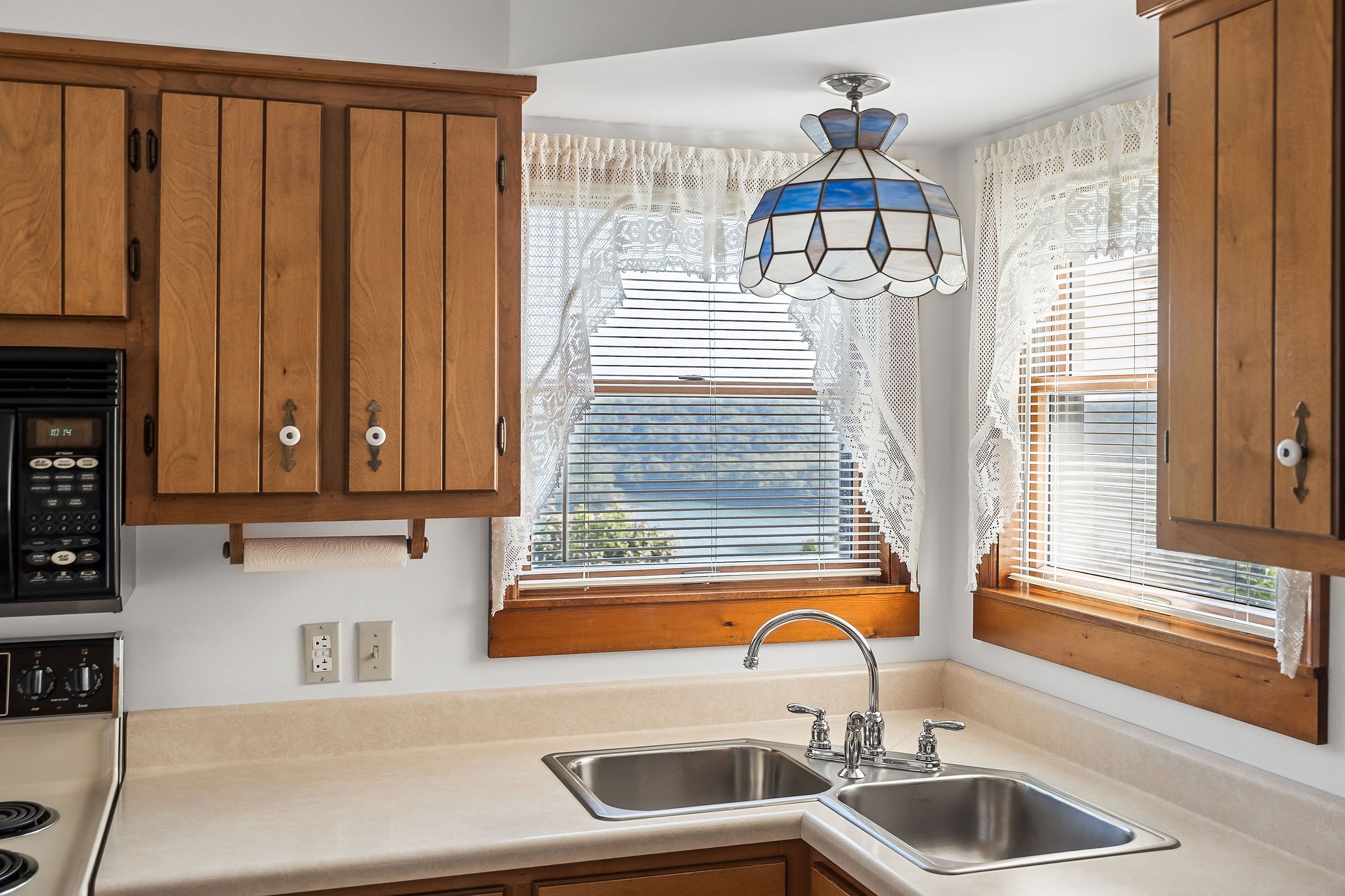 309 Cedar Hill Road Celina, TN 38551 - Photo 28 of 60 a kitchen with a sink and a window