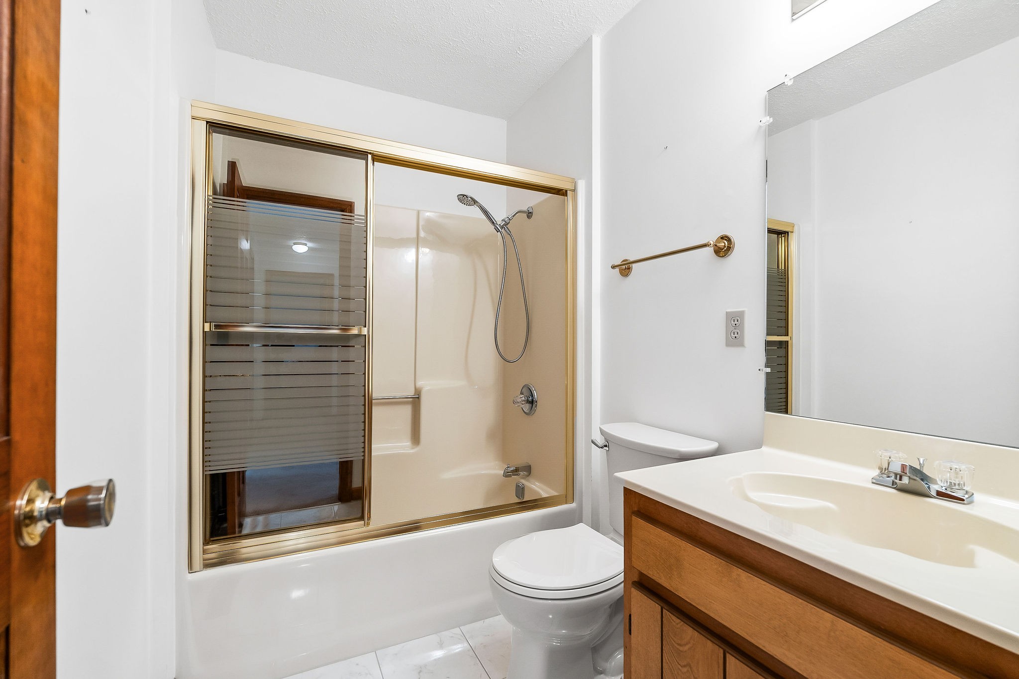 309 Cedar Hill Road Celina, TN 38551 - Photo 32 of 60 a bathroom with a granite countertop sink toilet and shower
