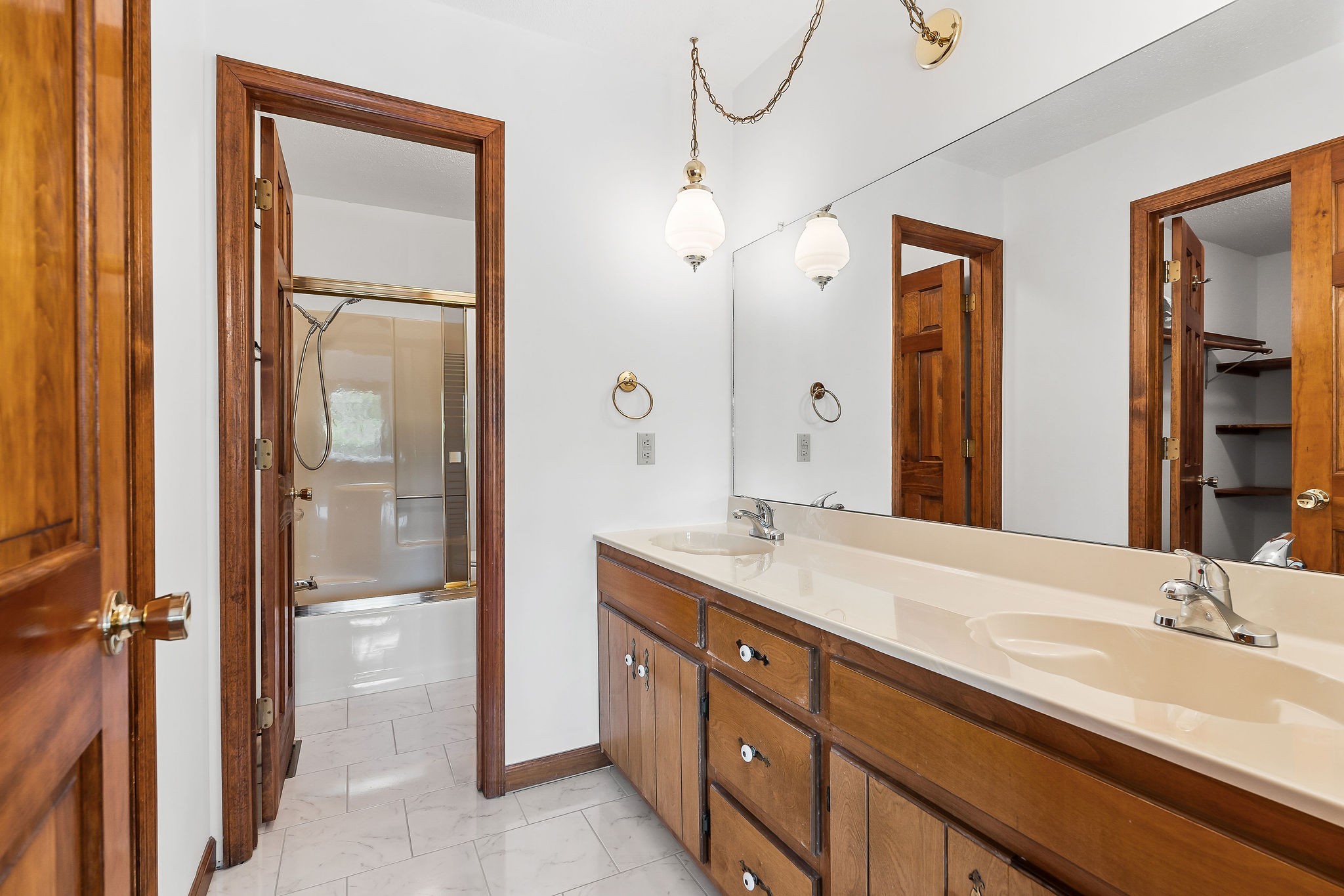 309 Cedar Hill Road Celina, TN 38551 - Photo 36 of 60 a bathroom with a granite countertop sink mirror and double