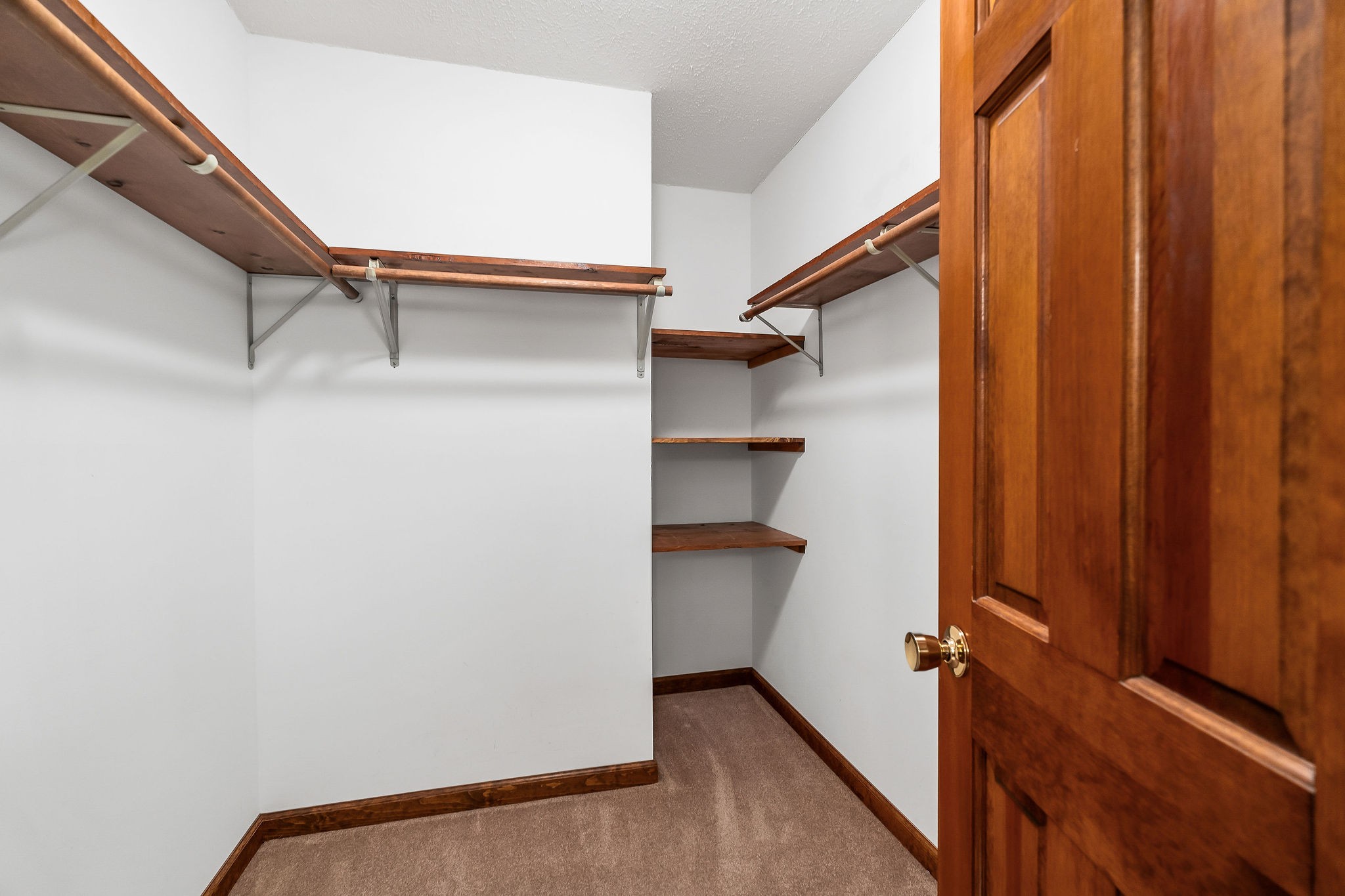 309 Cedar Hill Road Celina, TN 38551 - Photo 37 of 60 a view of walk in closet with empty racks