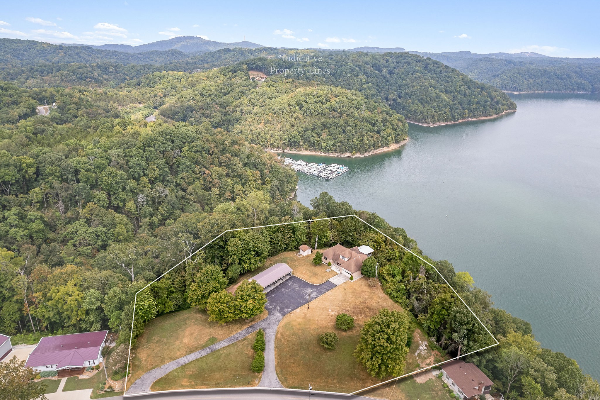 309 Cedar Hill Road Celina, TN 38551 - Photo 50 of 60 an aerial view of a house with a yard and mountain view