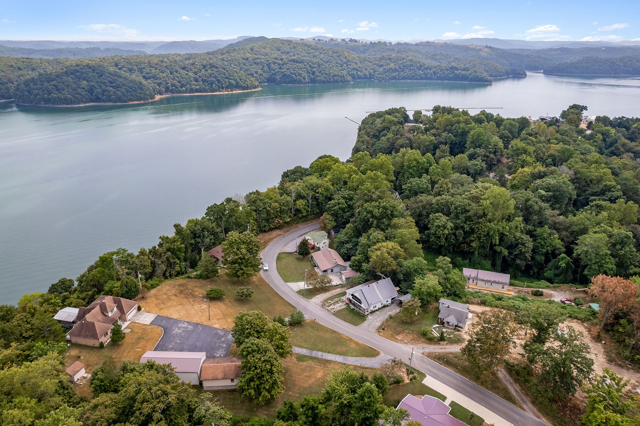 309 Cedar Hill Road Celina, TN 38551 - Photo 52 of 60 an aerial view of a house with outdoor space and lake view