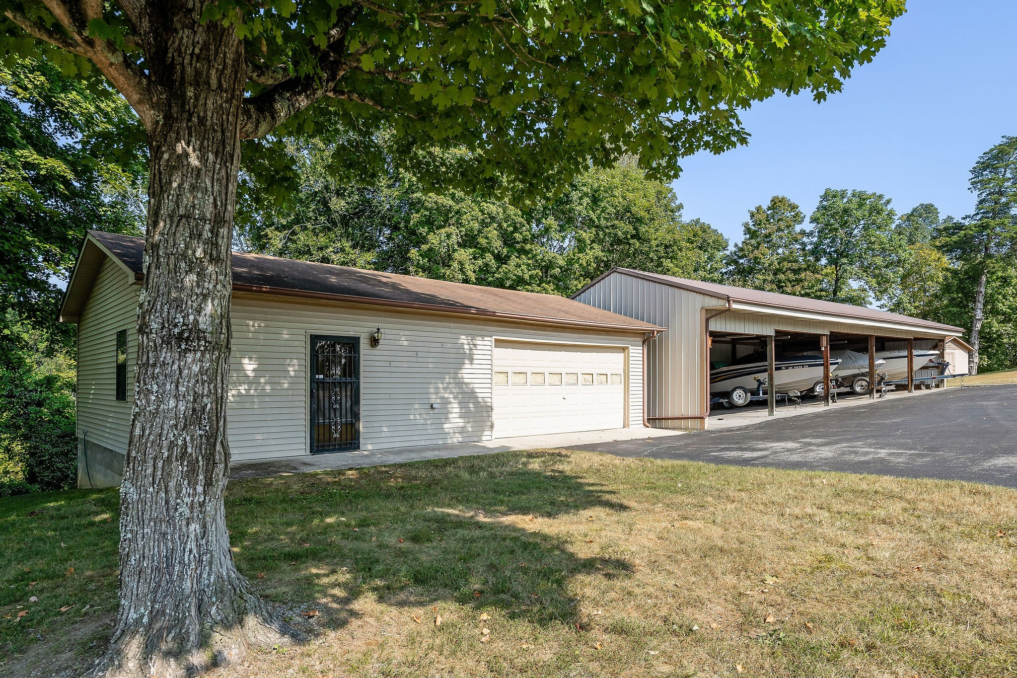 309 Cedar Hill Road Celina, TN 38551 - Photo 7 of 60 a front view of house with yard and trees