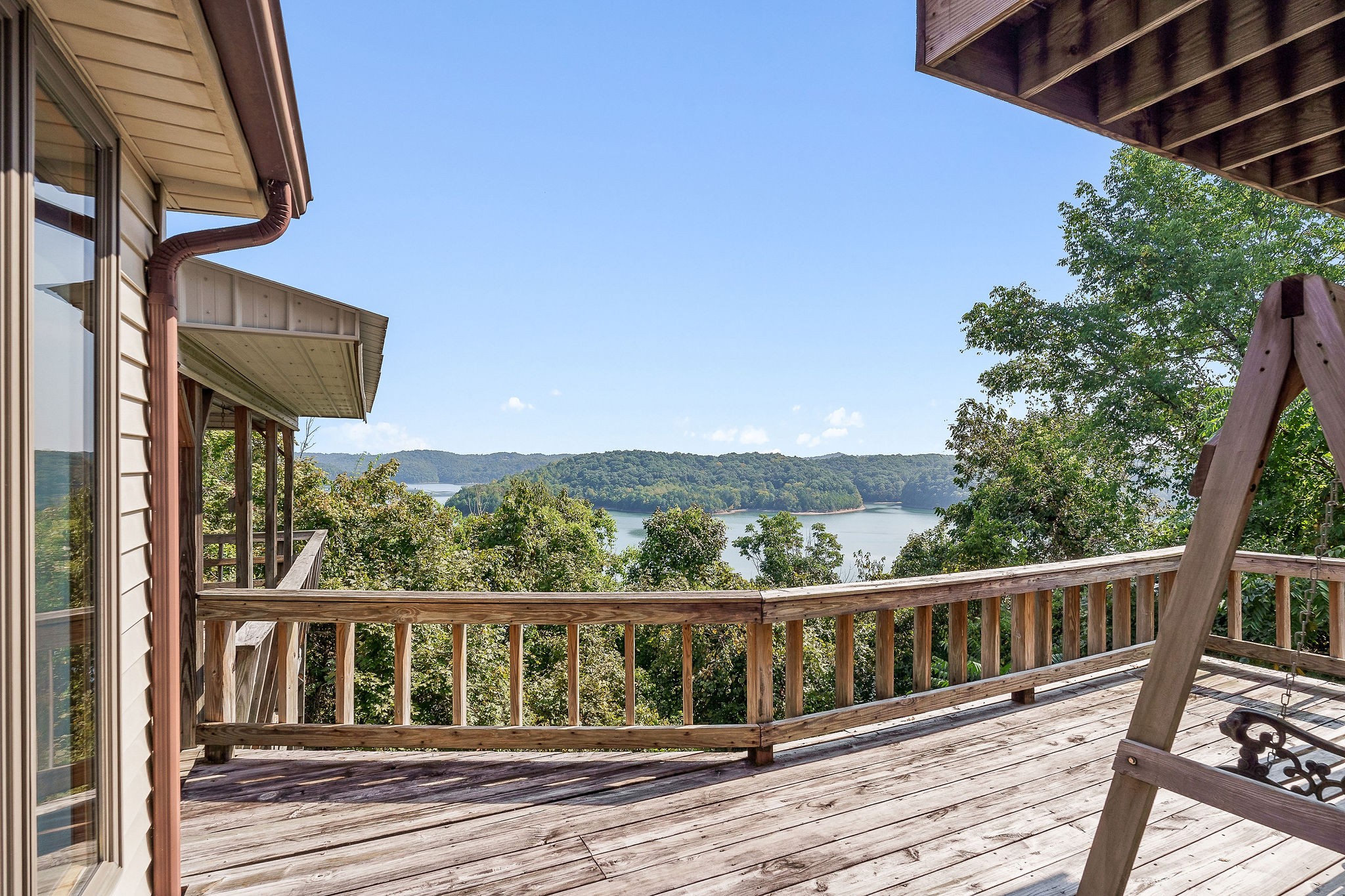 309 Cedar Hill Road Celina, TN 38551 - Photo 10 of 60 a view of balcony with wooden floor and fence