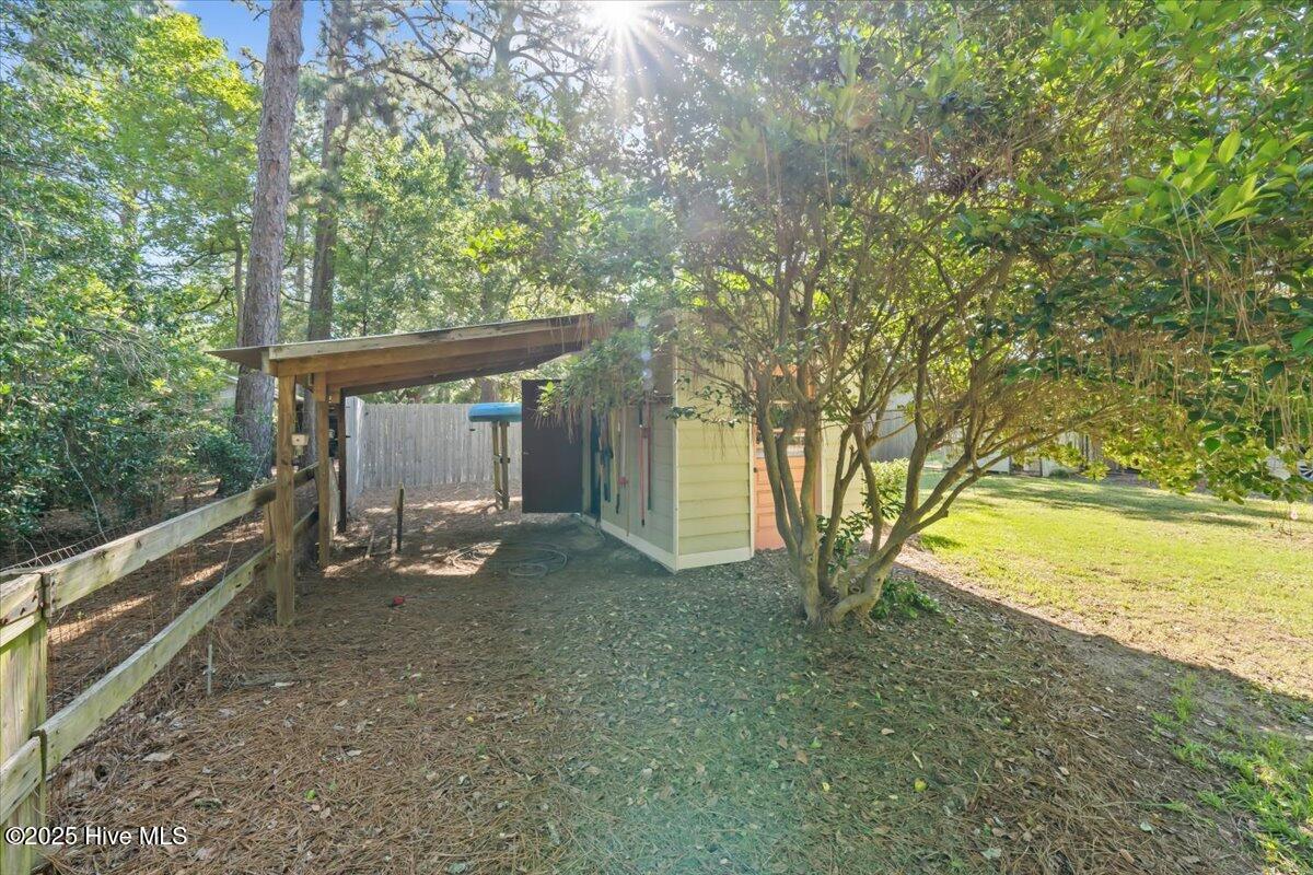 1484 Rays Bridge Road Whispering Pines, NC 28327 - Photo 44 of 47 Storage Shed