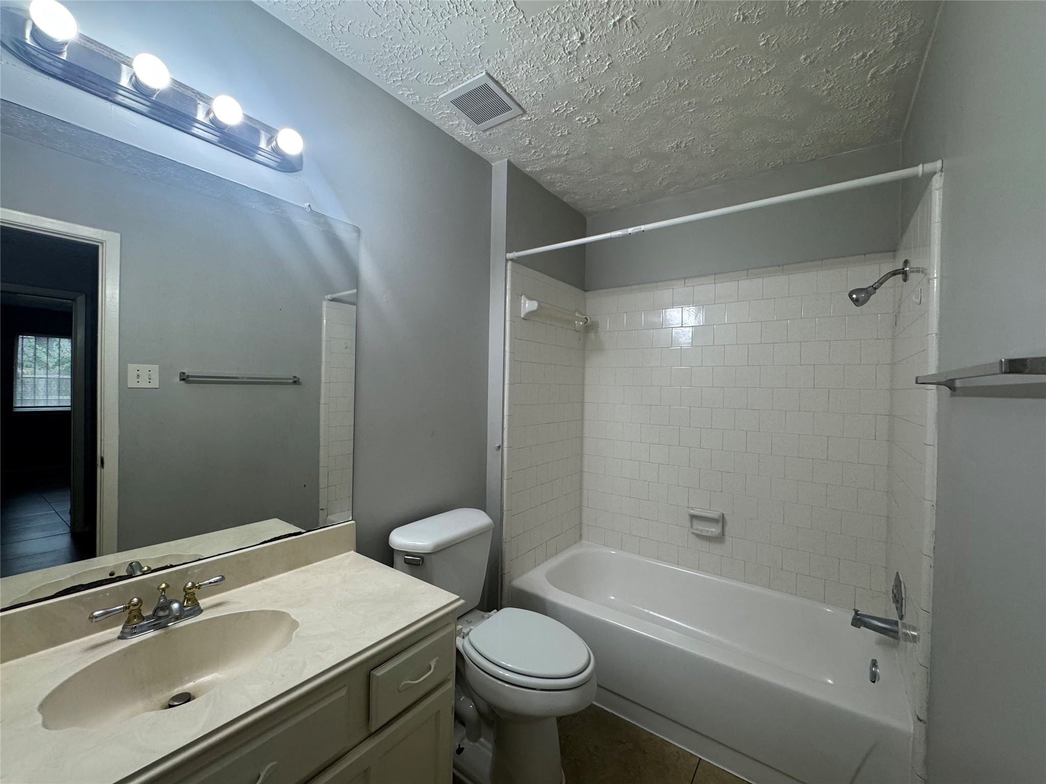13327 Reads Court Houston, TX 77015 - Photo 14 of 17 a bathroom with a sink toilet tub and shower