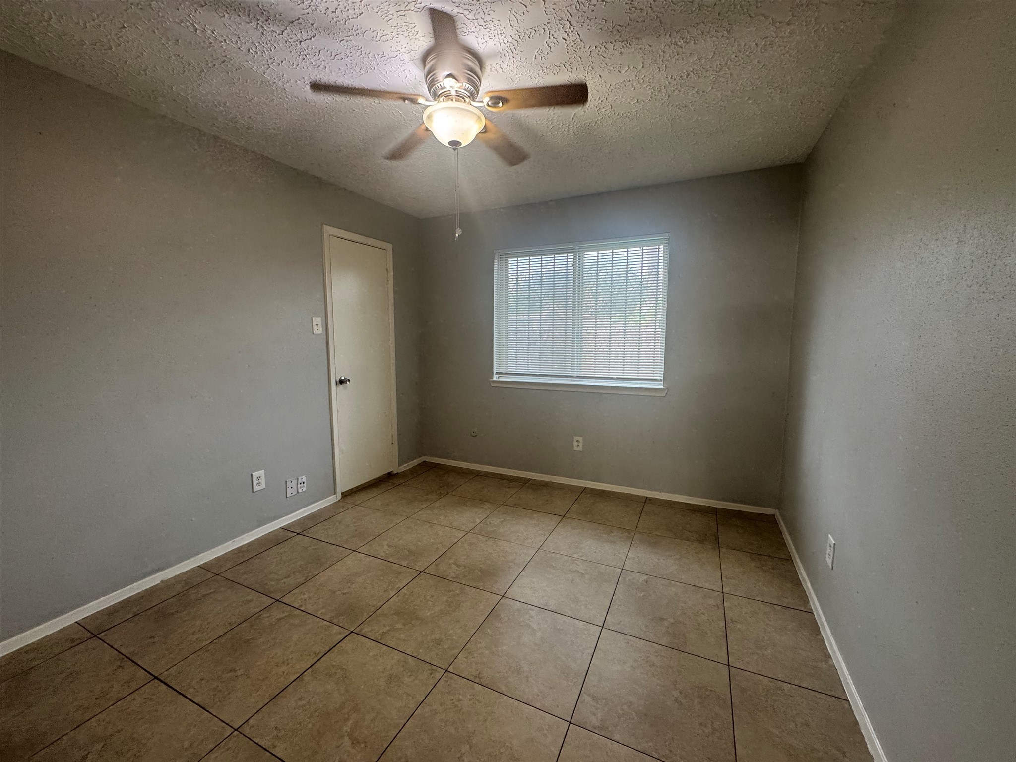 13327 Reads Court Houston, TX 77015 - Photo 15 of 17 a view of an empty room with a window