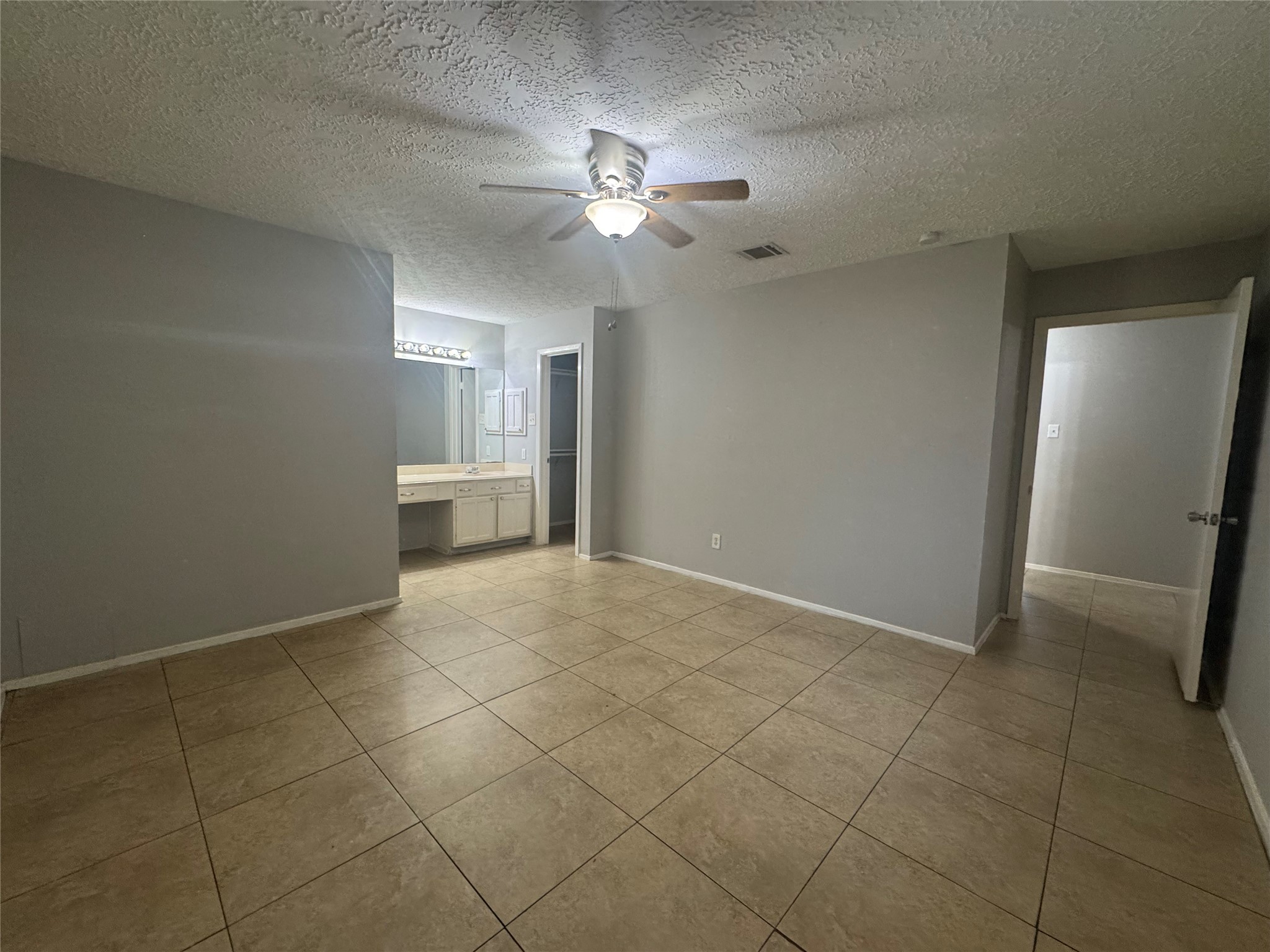 13327 Reads Court Houston, TX 77015 - Photo 9 of 17 a view of an empty room with a window