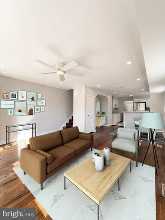 a living room with furniture and a table