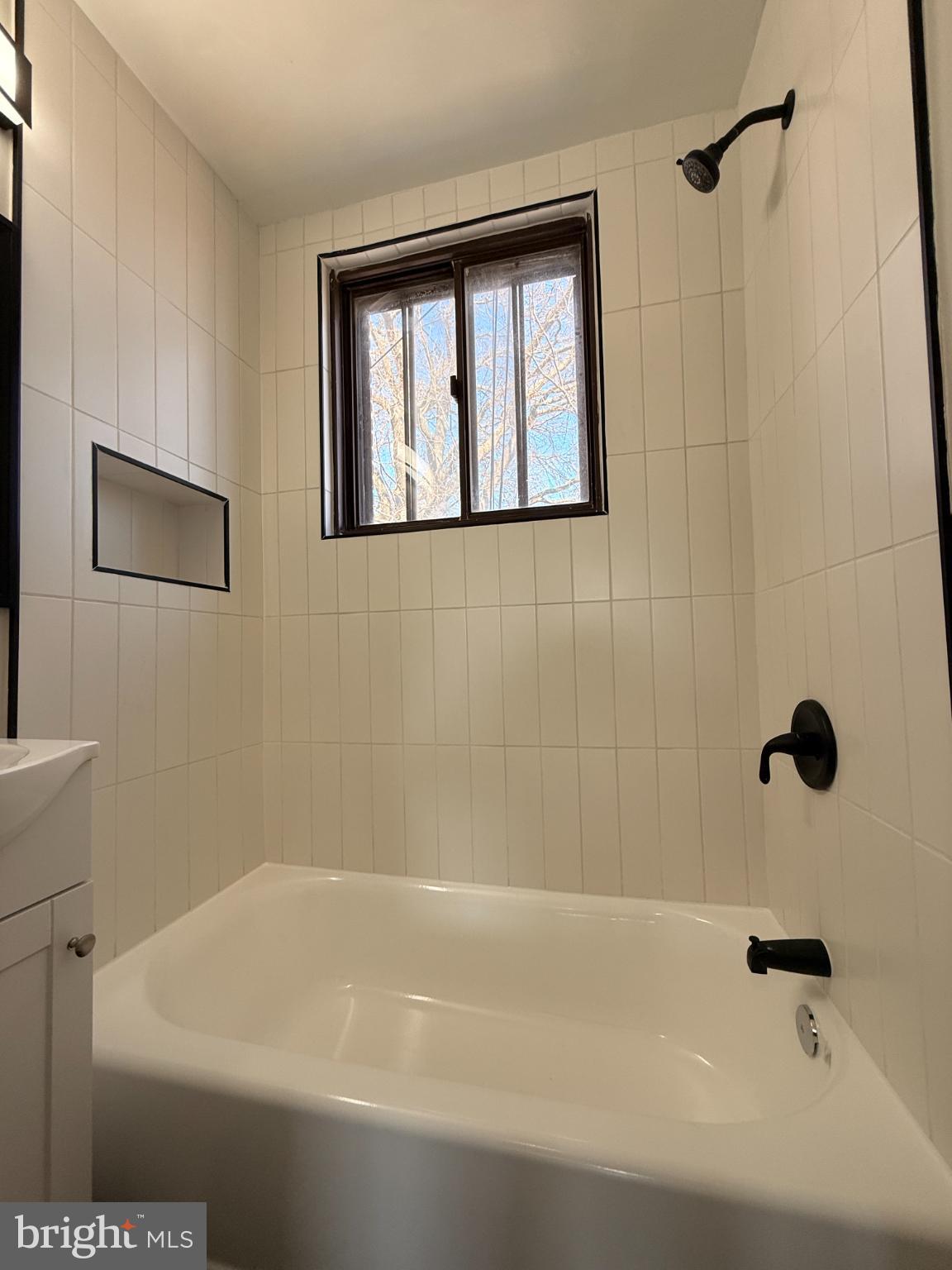 41 Tuckerman Street Northwest Washington, DC 20011 - Photo 19 of 49 a bathroom with a bathtub